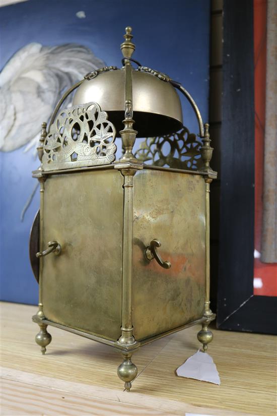 A lantern clock with later movement height 39cm